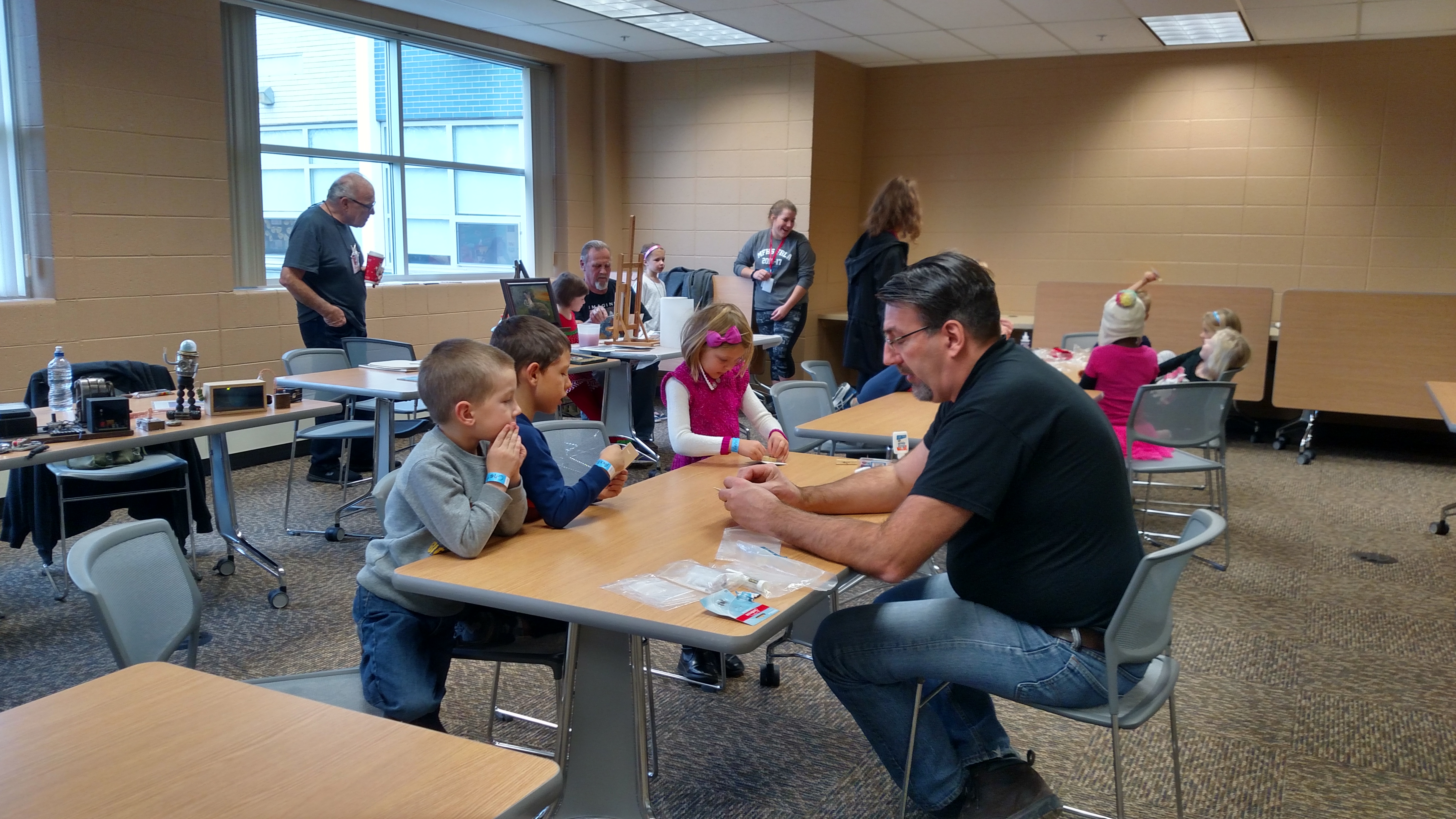 Gregory Juris volunteering at Parents Annual Drop N Shop Event December 2016